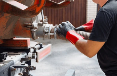 Technician Connecting Pump Hose